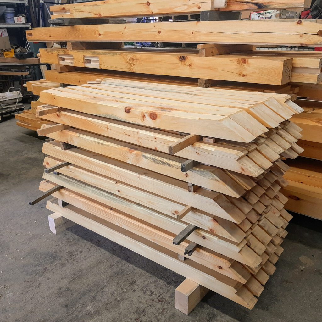 stack of timber frame rafters